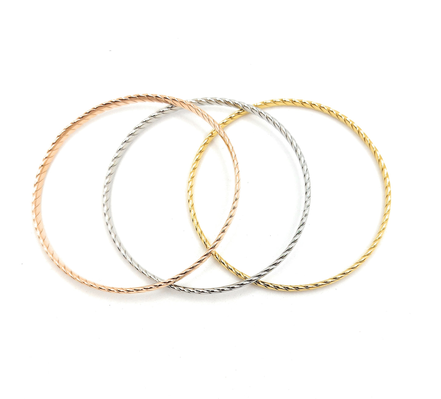 Set de 3 Pulseras Individuales Texturizadas · Oro Amarillo, Plata y Oro Rosa
