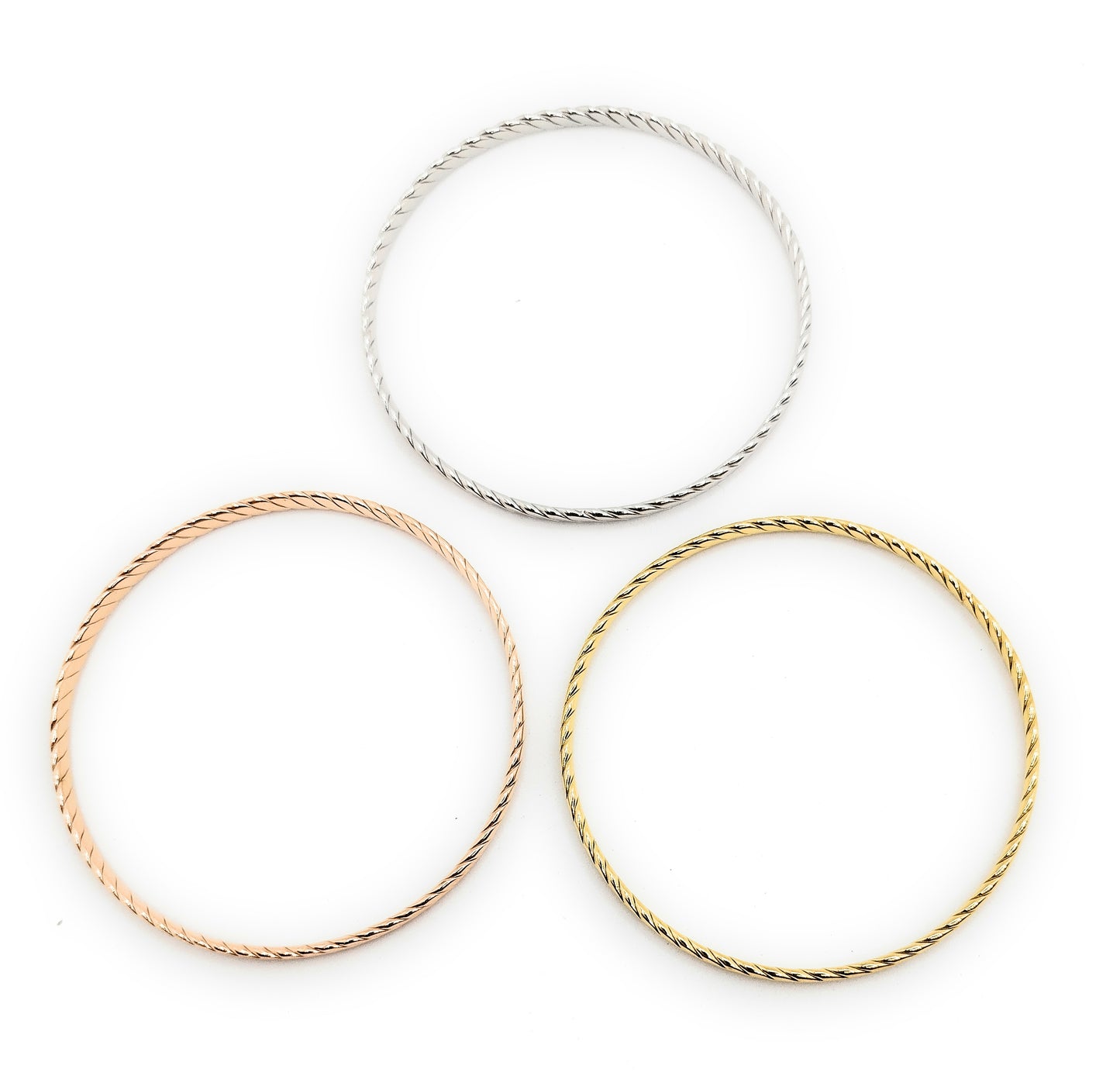 Set de 3 Pulseras Individuales Texturizadas · Oro Amarillo, Plata y Oro Rosa
