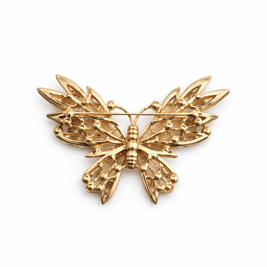 Broche joya de mariposa dorada con cristales rosados, verde agua y circonitas