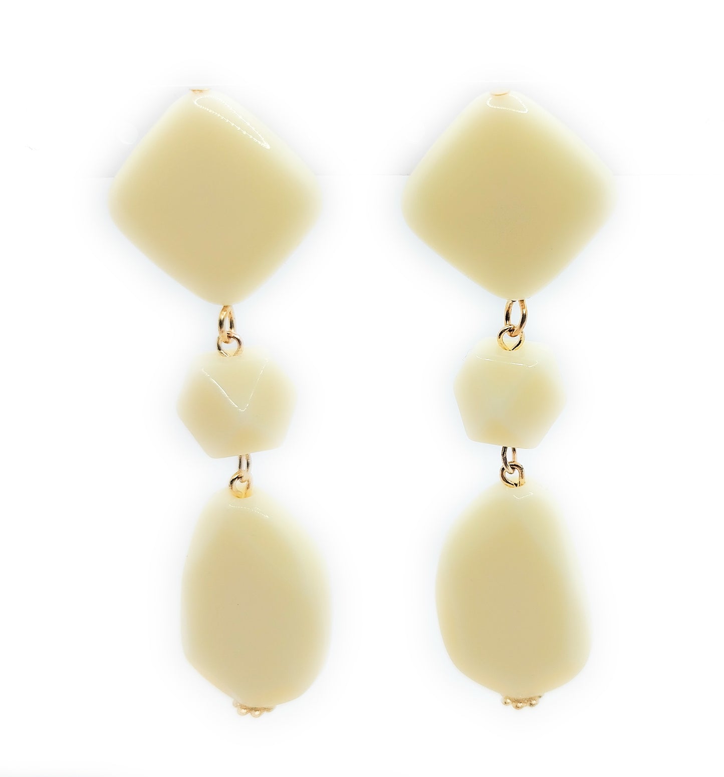 Pendientes largos y ligeros de flamenca · Marfil