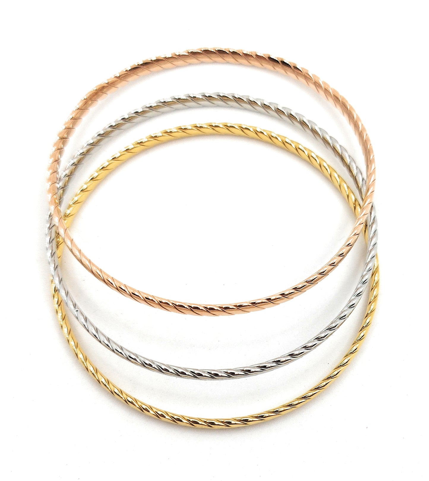 Set de 3 Pulseras Individuales Texturizadas · Oro Amarillo, Plata y Oro Rosa