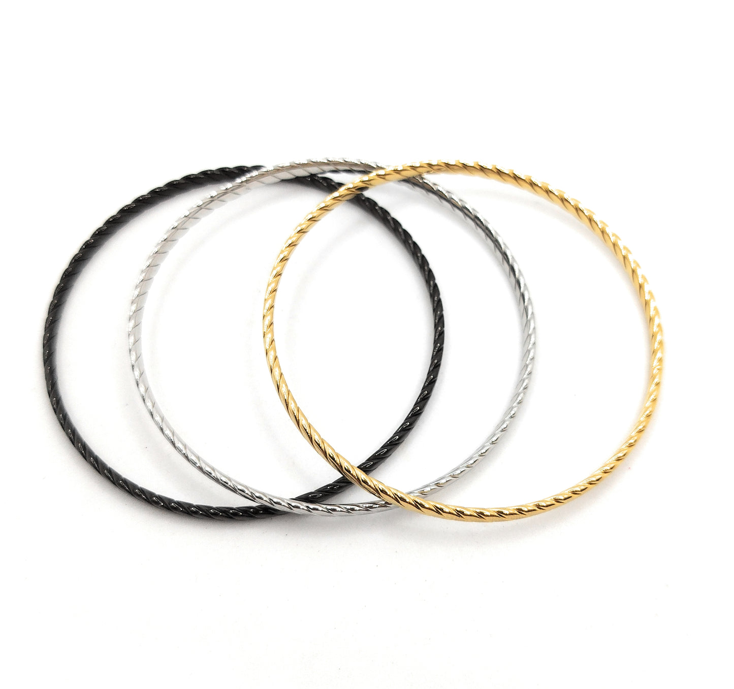 Set de 3 Pulseras Individuales Texturizadas · Oro Amarillo, Plata y Negro