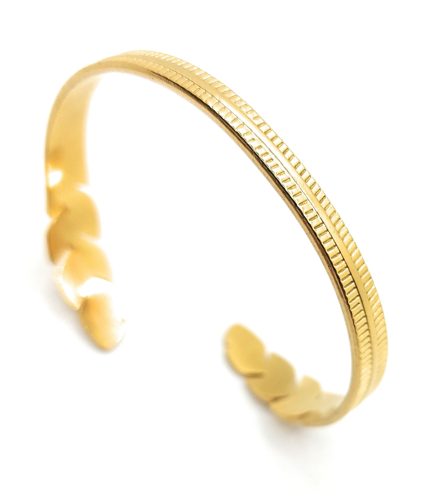 Brazalete Diseño Pluma · Oro Brillo Sútil