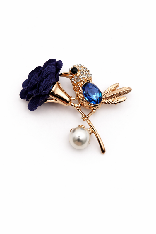 Broche dorado de pájaro con flor de tela azul noche y cristal azul, circonitas brillantes y perla