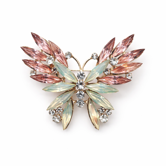 Broche joya de mariposa dorada con cristales rosados, verde agua y circonitas