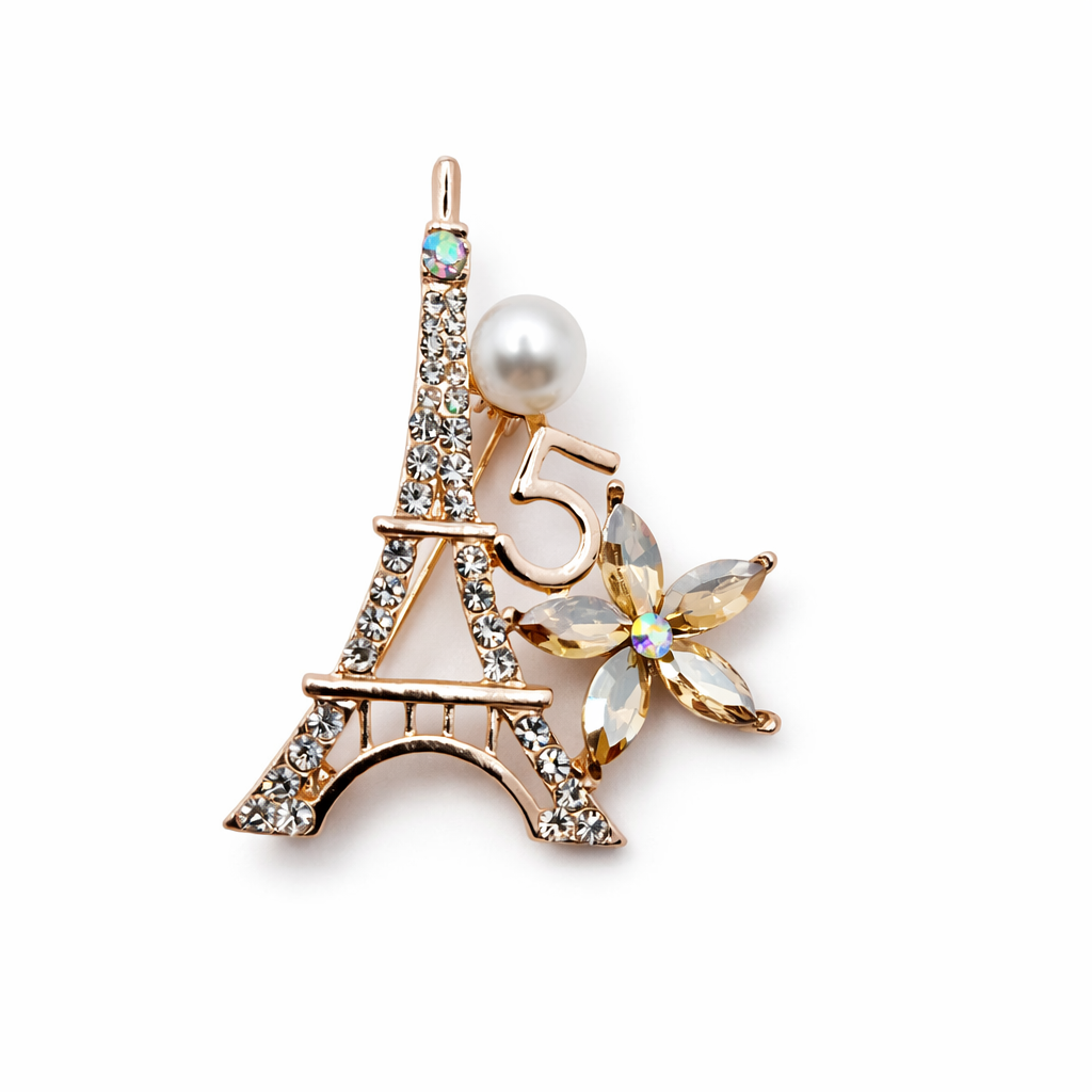 Broche joya dorado beige en forma Torre Eiffel Paris con cristales facetados brillantes y perla