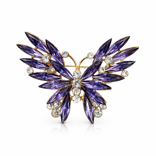 Broche joya de mariposa dorada con cristales morados y circonitas
