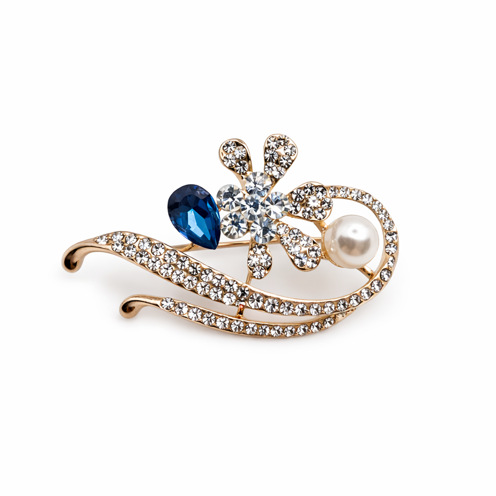 Broche joya dorado elegante flor con cristal facetado azul, circonitas brillantes y perla
