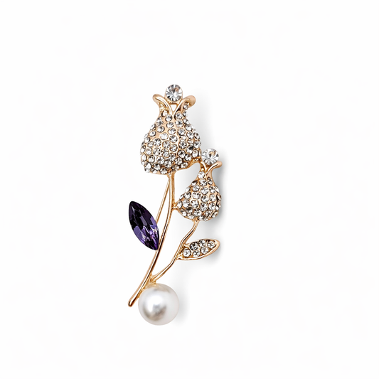 Broche joya dorado forma floral de tulipán con detalles en morado, cristales y perla