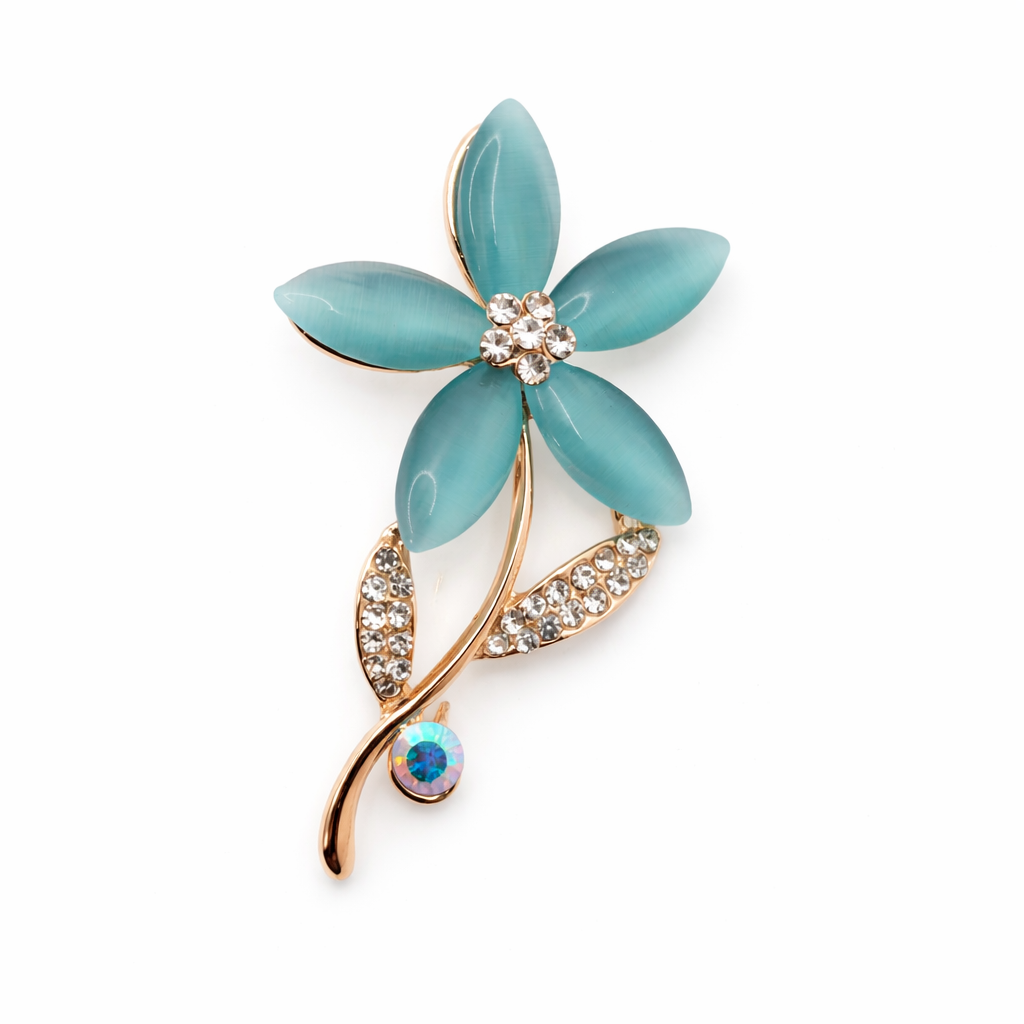 Broche joya floral celeste dorado con cristales y circonitas brillantes