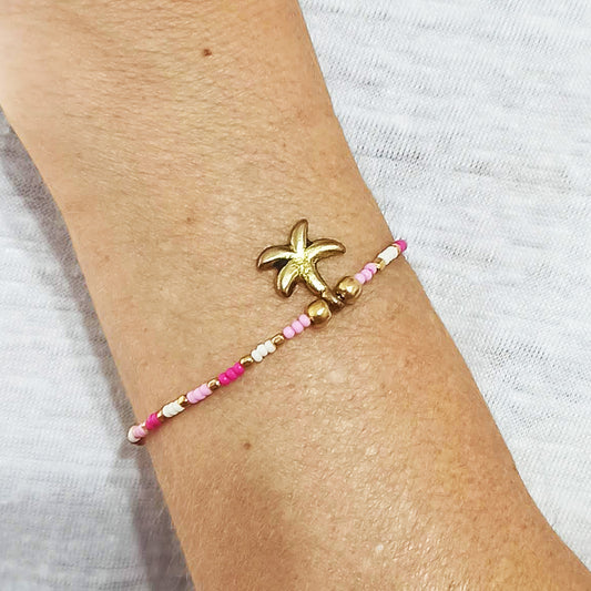 Pulsera Cuentas de Perlas con Colgante Estrella de Mar · Rosa Blanco