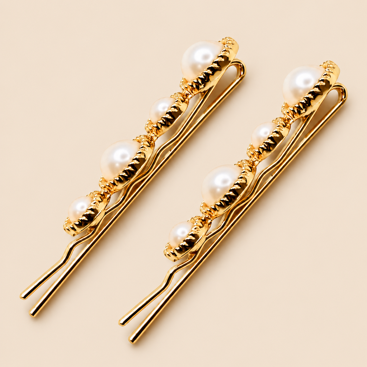 Pinzas doradas para el pelo con perlas · Pack de 2