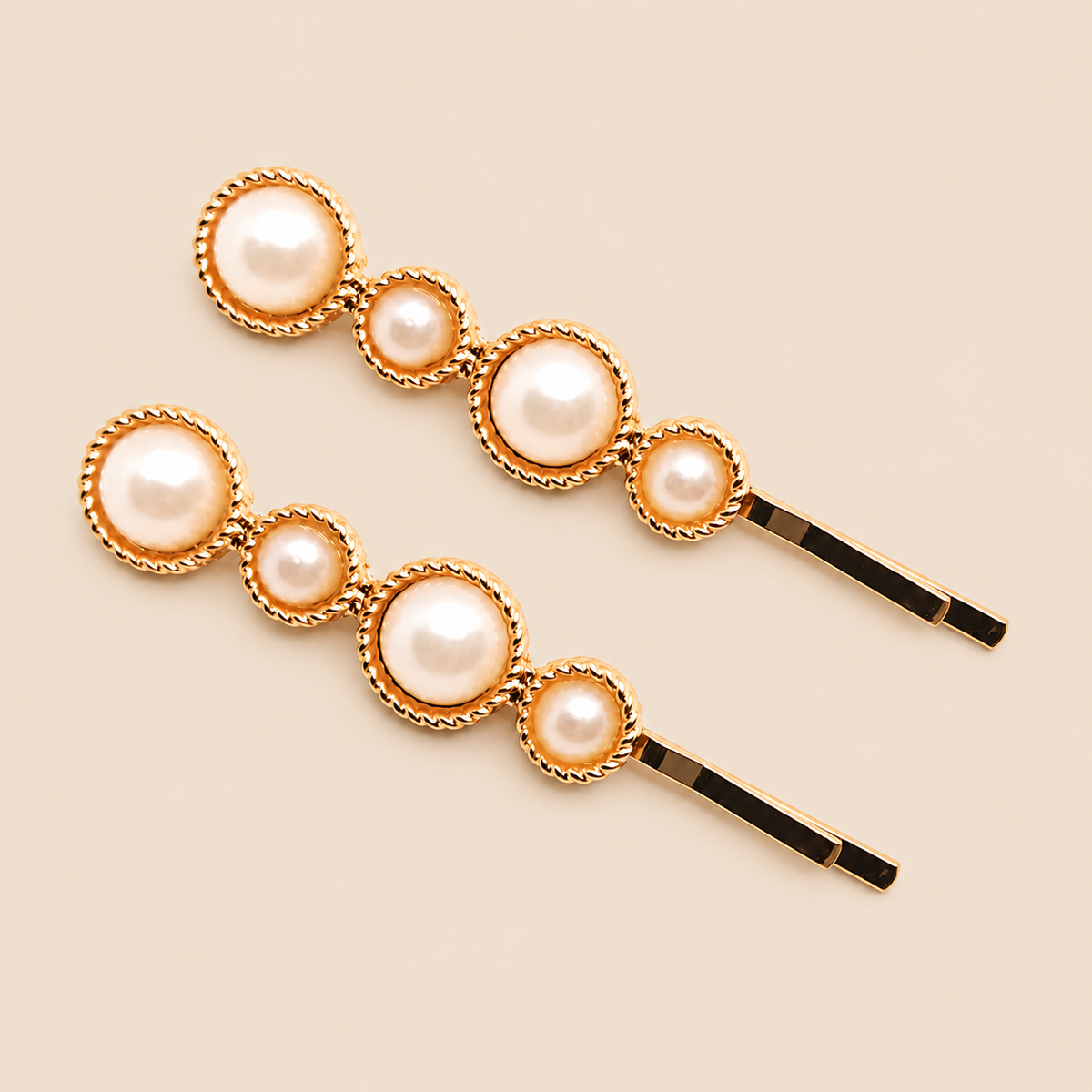 Pinzas doradas para el pelo con perlas · Pack de 2